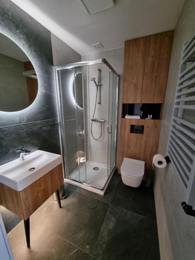 Hotel Ros Pisz Bagian luar foto