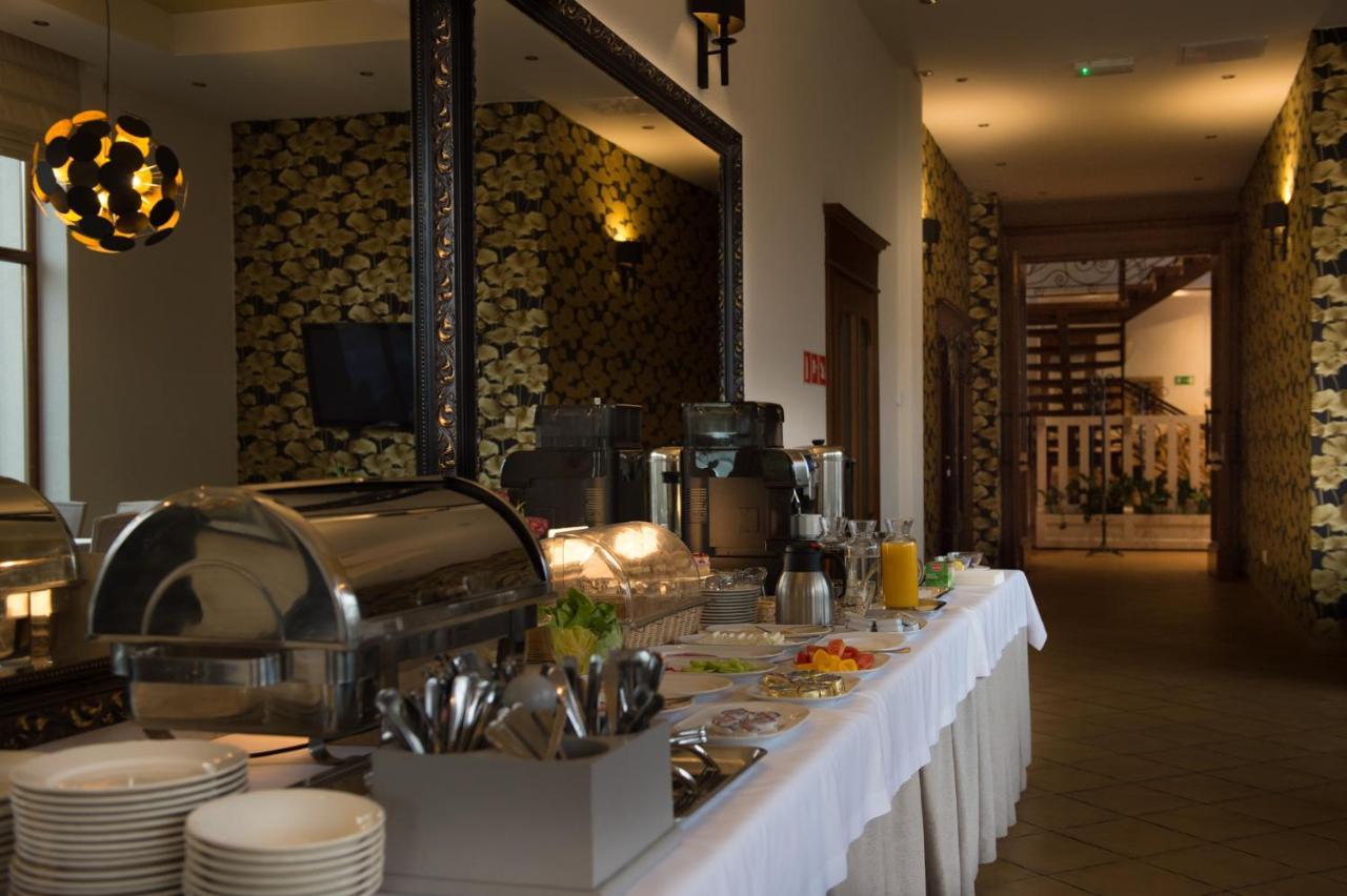Hotel Ros Pisz Bagian luar foto
